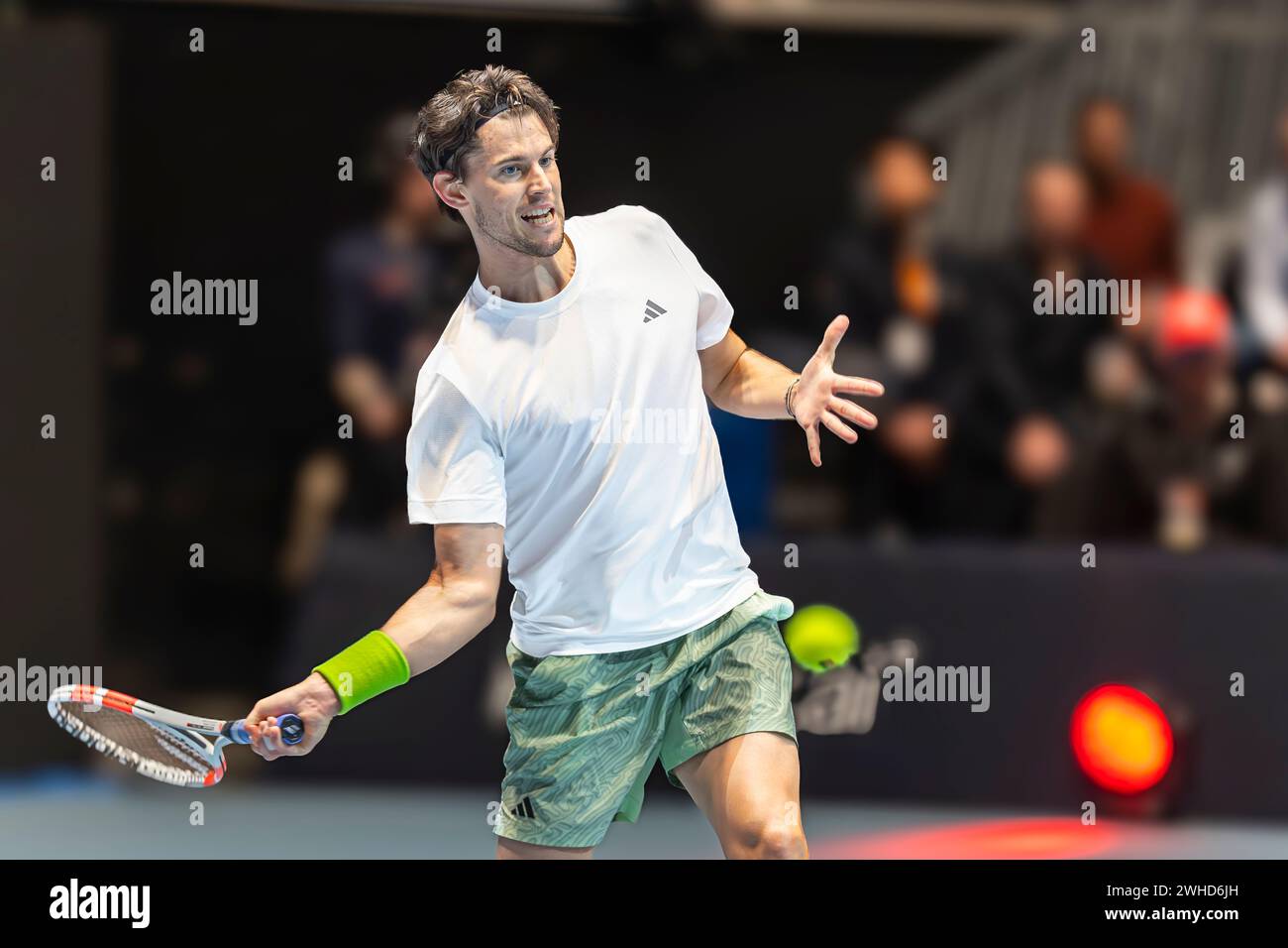 Oslo, Norway 09 February 2024  Dominic Thiem of Austria plays a forehand shot against Holger Rune of Denmark  during the Round Robin Ultimate Tennis Showdown tournament held at the Telenor Arena in Oslo, Norway credit: Nigel Waldron/Alamy Live News Stock Photo