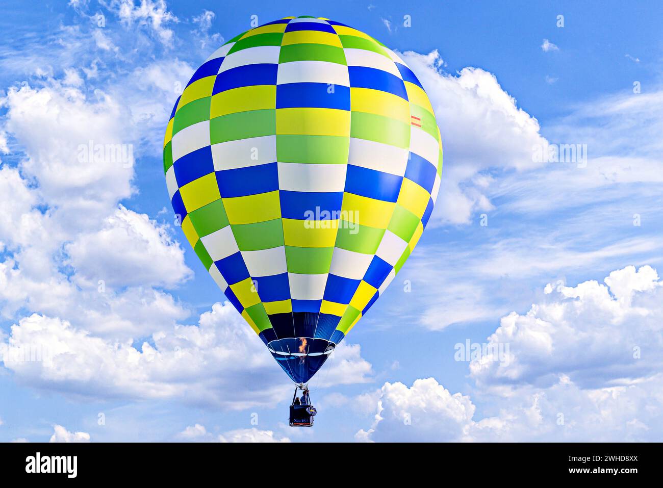 Colorful hot air balloon flying over blue sky with white cloud Stock ...