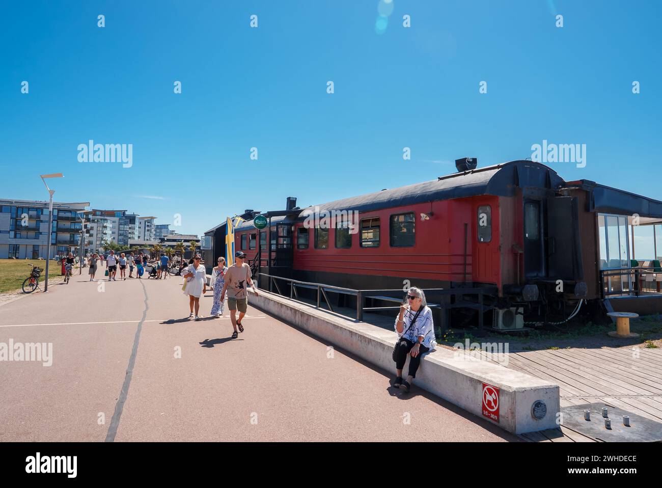 Vintage Red Train Carriage Basking in Sunshine, Helsingborg, Sweden Day Stock Photo