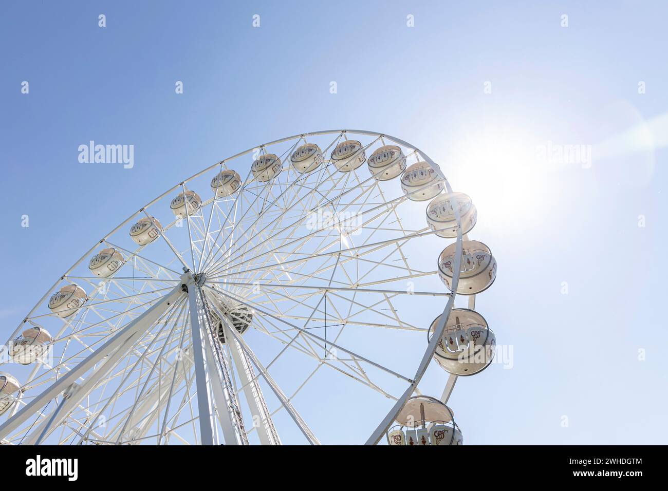 White Ferris wheel in front of a blue sky in Warnemünde, Hanseatic city of Rostock, Baltic Sea coast, Mecklenburg-Western Pomerania, Germany, Europe Stock Photo