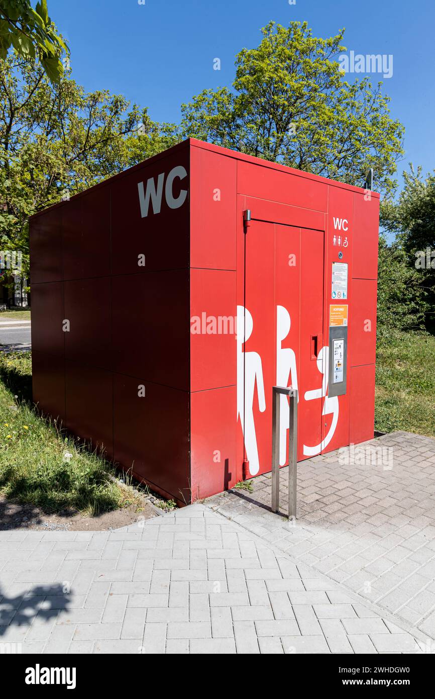 WC letters on red modern toilet facility barrier-free in Warnemünde, Hanseatic city of Rostock, Baltic Sea coast, Mecklenburg-Western Pomerania, Germany, Europe Stock Photo