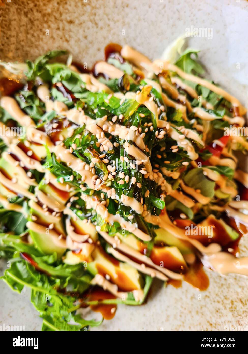 Sesame seeds and unagi sauce in the restaurant hires stock photography