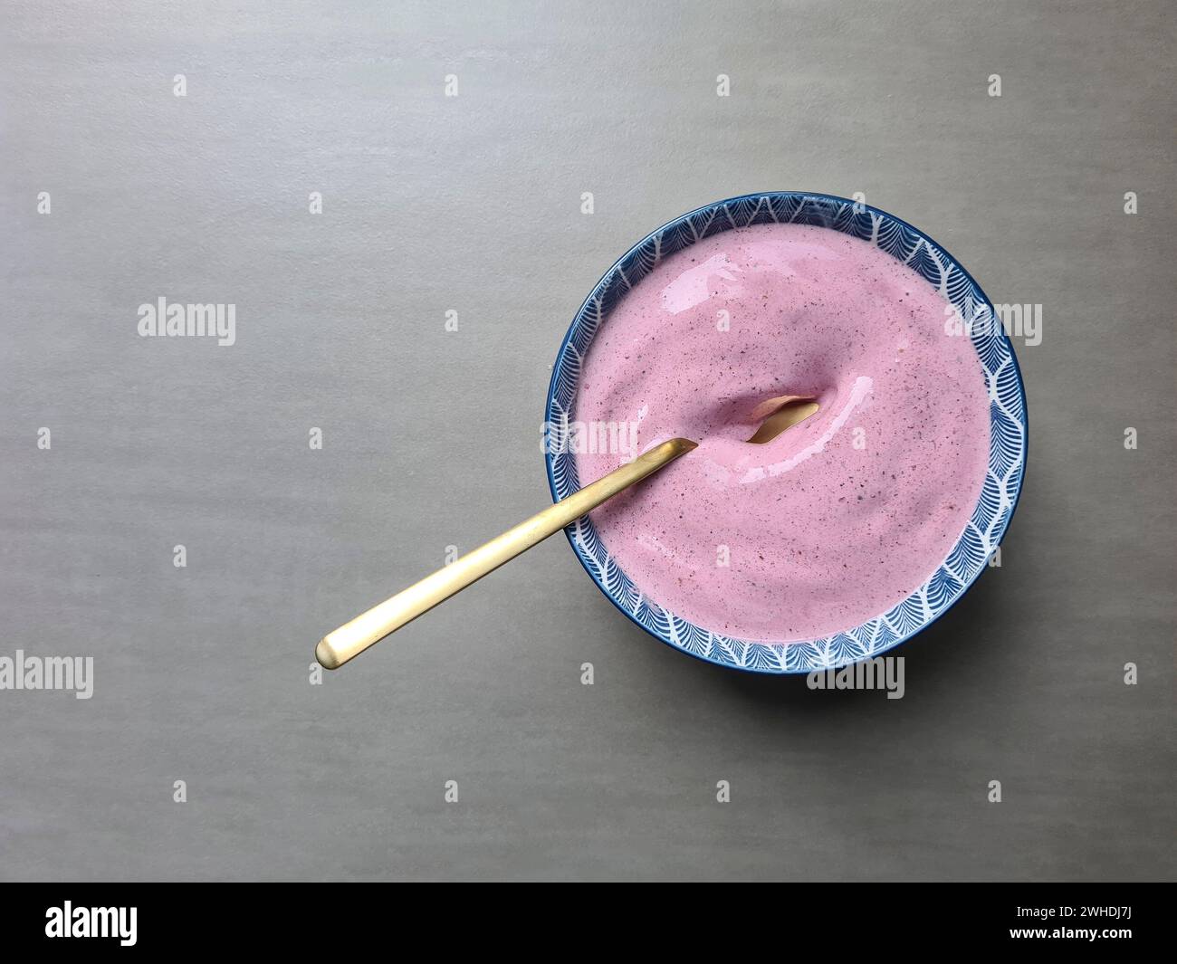 Dessert, bowl with quark, berry quark, blackberry flavor Stock Photo