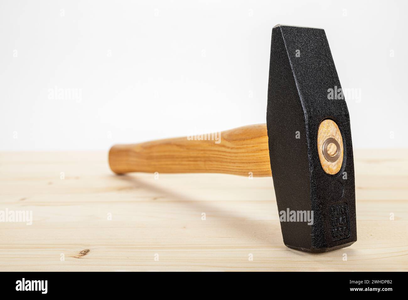 Locksmith's hammer, wood background, Stock Photo