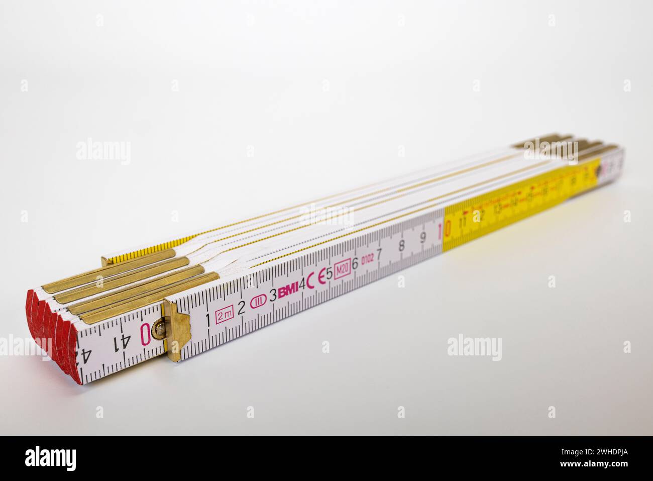Folding rule, folding ruler, blur, white background, Stock Photo