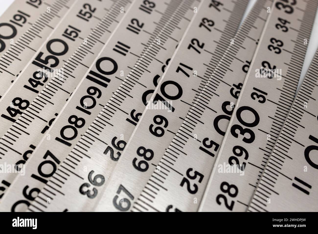 Metal folding rule, detail, folding ruler Stock Photo - Alamy