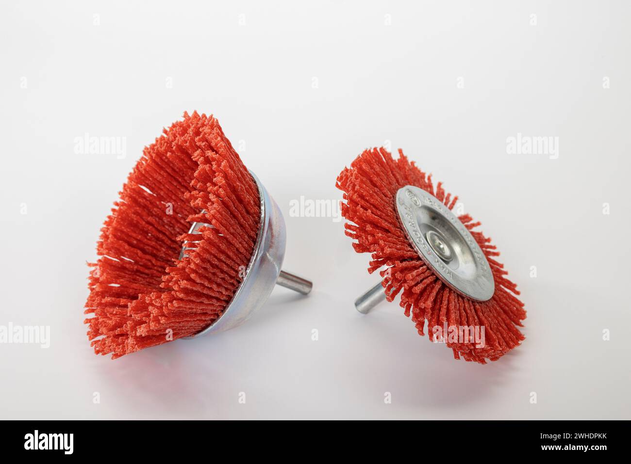 Two nylon brushes, cup brush, disk brush, for drill, white background, Stock Photo