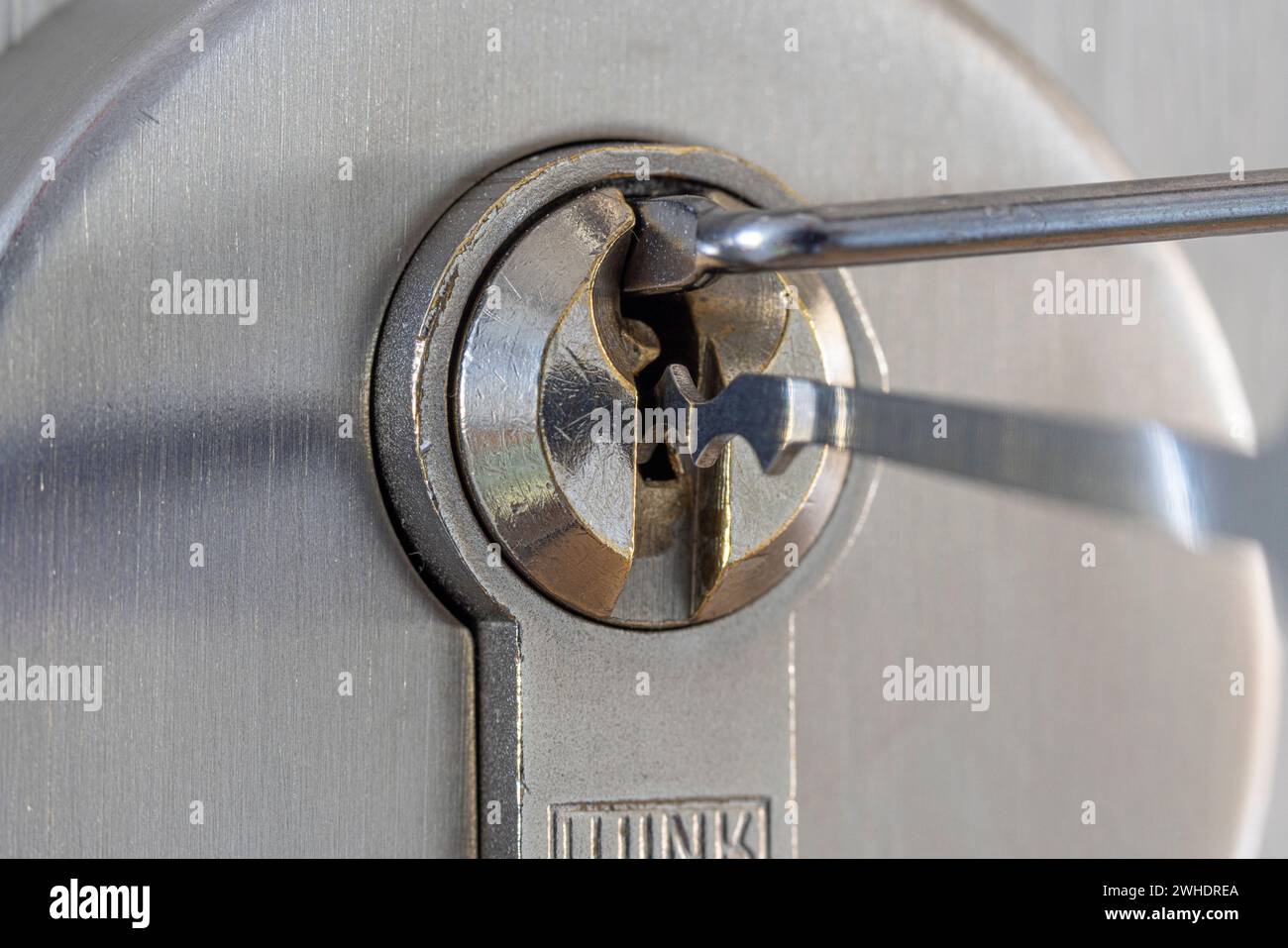Open cylinder lock with lockpicking tool, detail, symbol image, lost