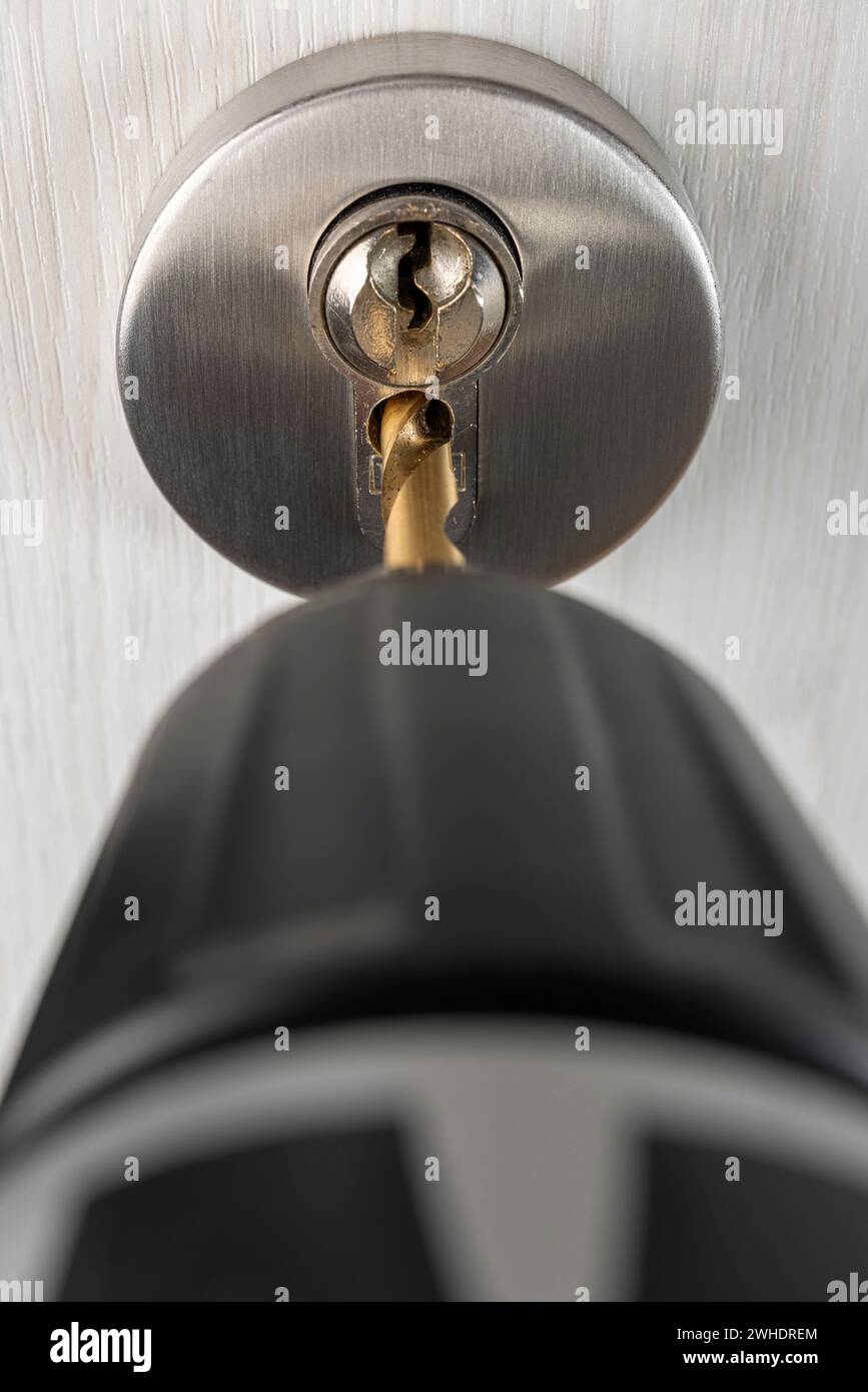 Drill out cylinder lock with drill, detail, symbol image, lost door key