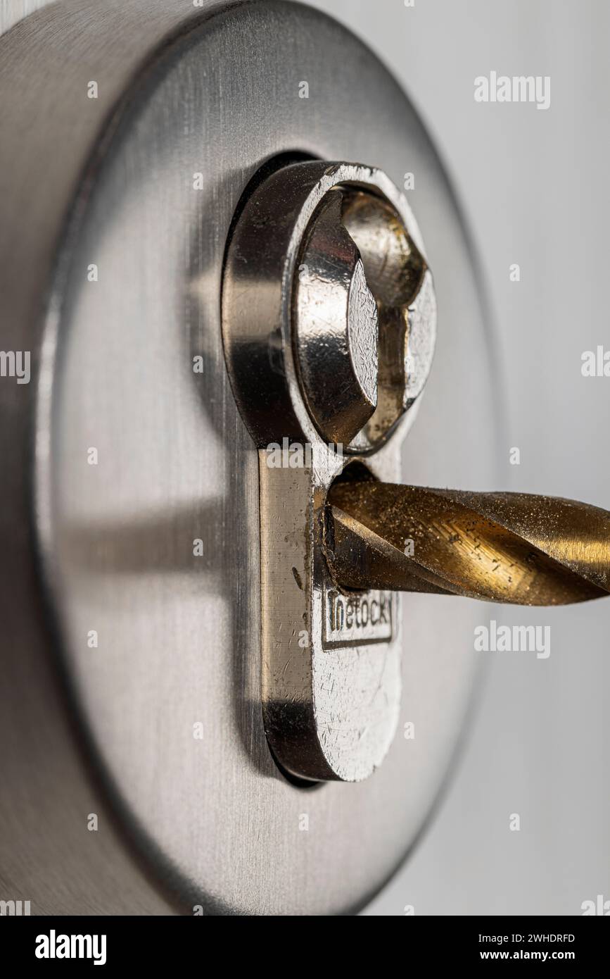 Drill out cylinder lock with drill, detail, symbol image, lost door key