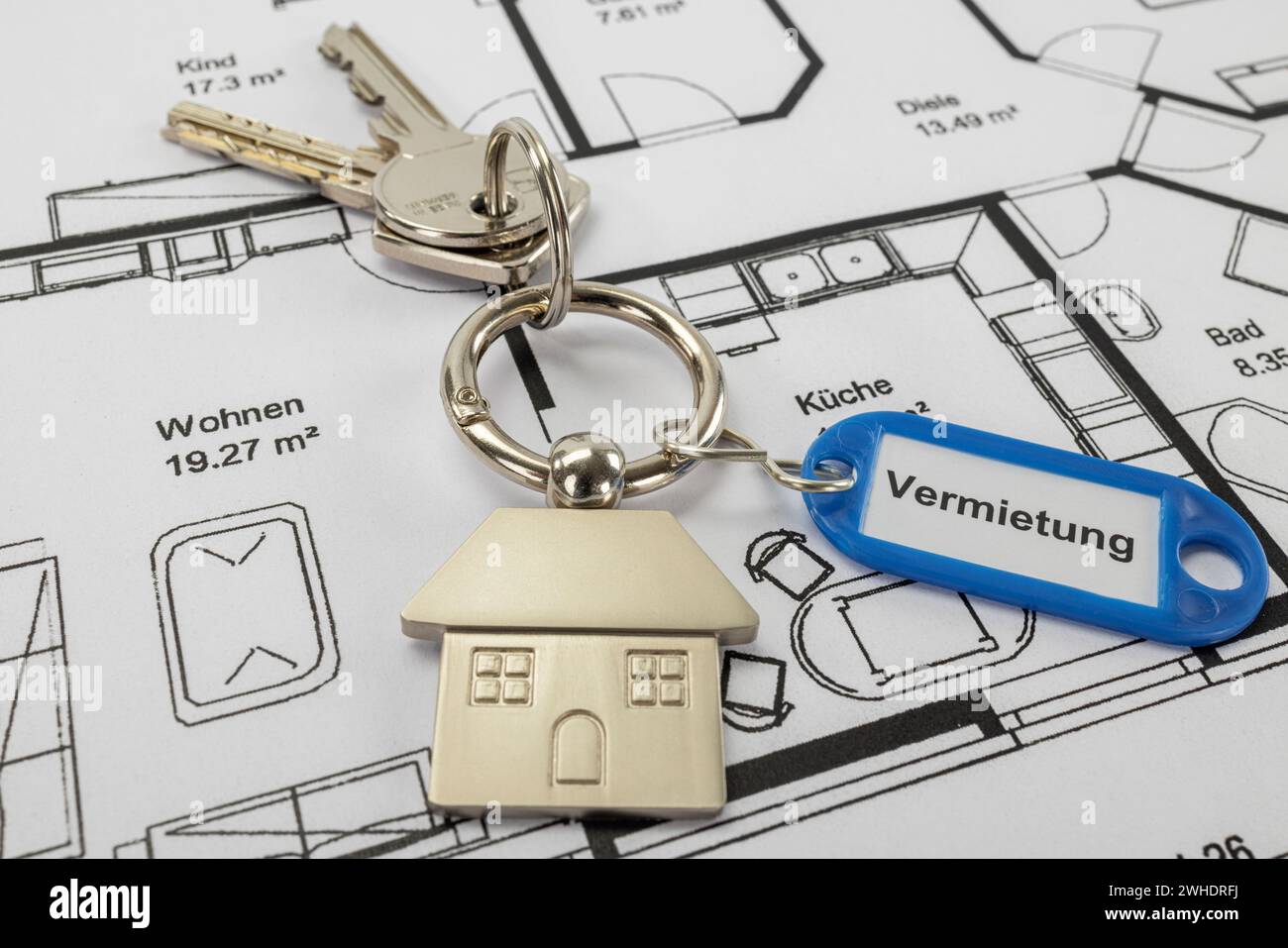 Floor plan, key ring with metal key ring house, blue key ring, labeled ëRentingë, Stock Photo