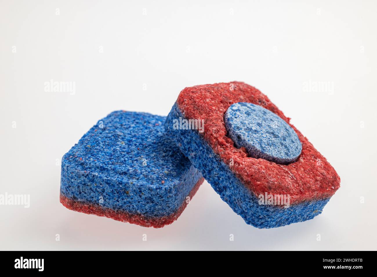 Two dishwasher detergent tabs for dishwashers, white background Stock