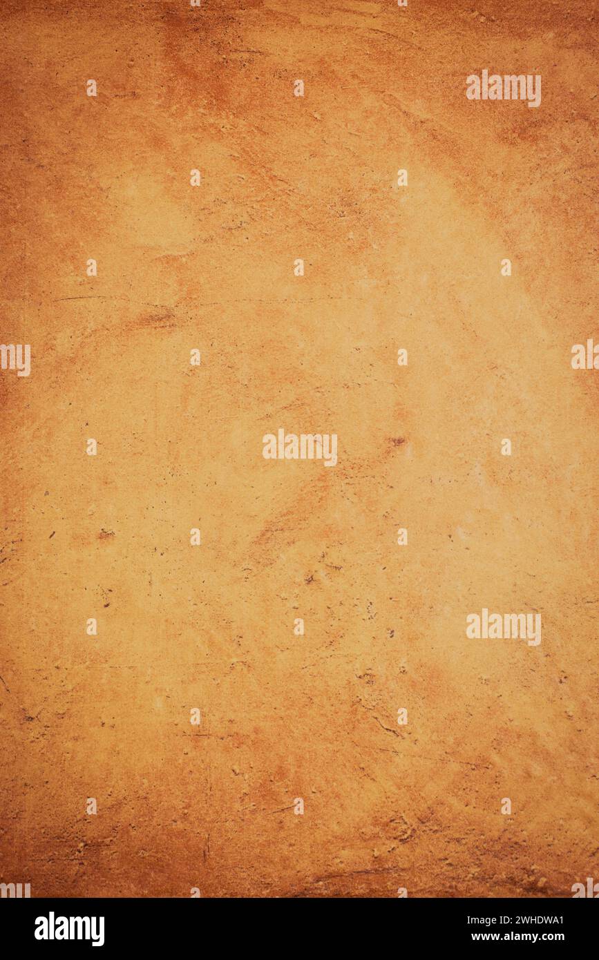 Ocher stone wall Stock Photo - Alamy