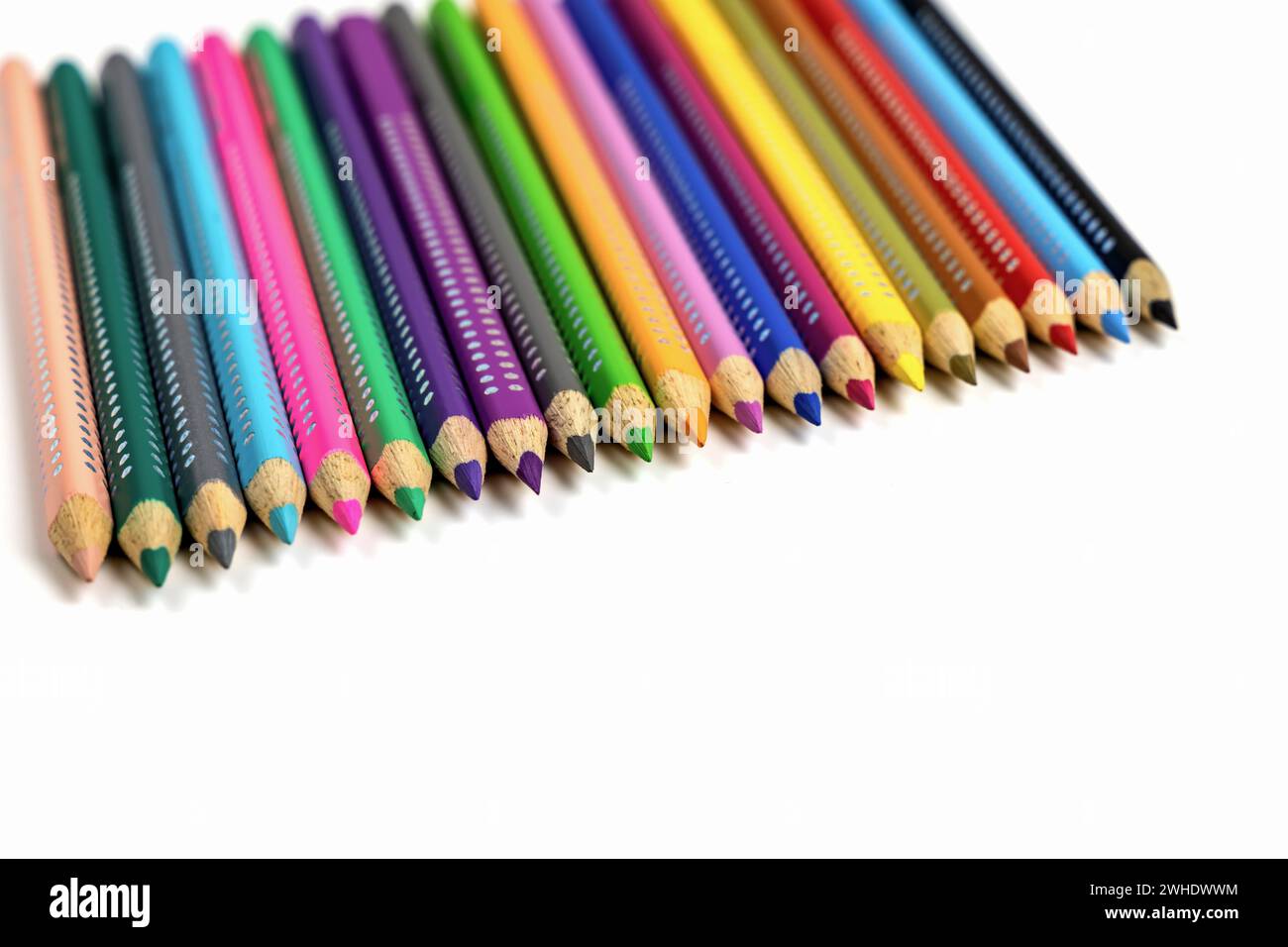 Faber-Castell colored pencils for drawing various colors and coloring book for children. Stock Photo