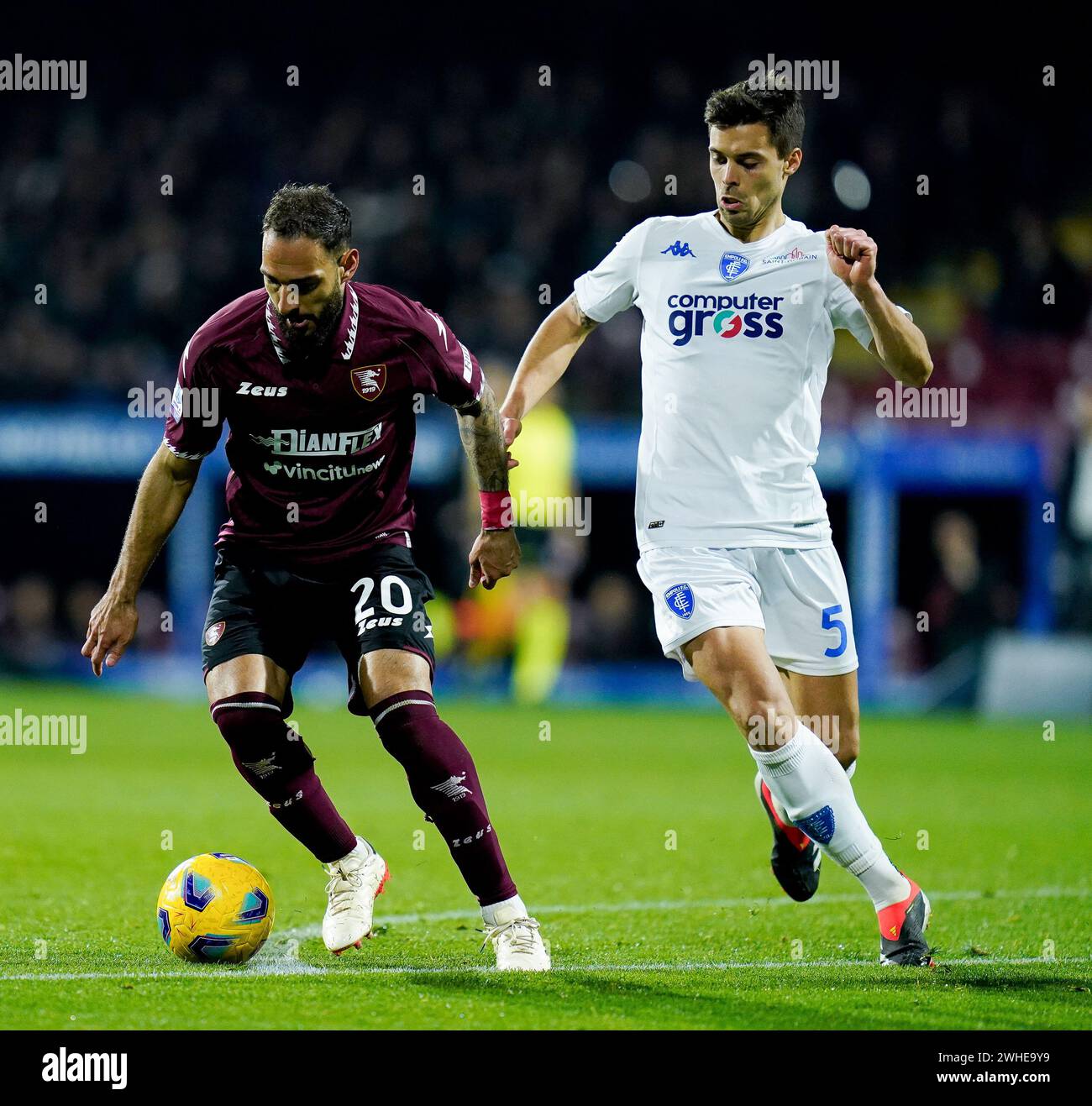 Salerno, Italy. 09th Feb, 2024. Grigoris Kastanos of US Salernitana and Alberto Grassi of Empoli FC compete for the ball during the Serie A match between US Salernitana and Empoli FC at Stadio Arechi on February 9, 2024 in Salerno, Italy. Credit: Giuseppe Maffia/Alamy Live News Stock Photo