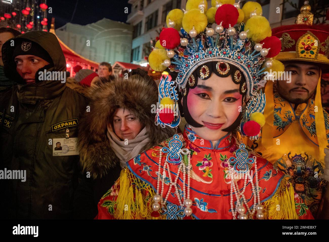 Moscow, Russia. 9th of February, 2024. A woman performs during a ceremony in Kamergersky Lane to open the Moscow Festival of Chinese New Year in central Moscow, Russia. Credit: Nikolay Vinokurov/Alamy Live News Stock Photo