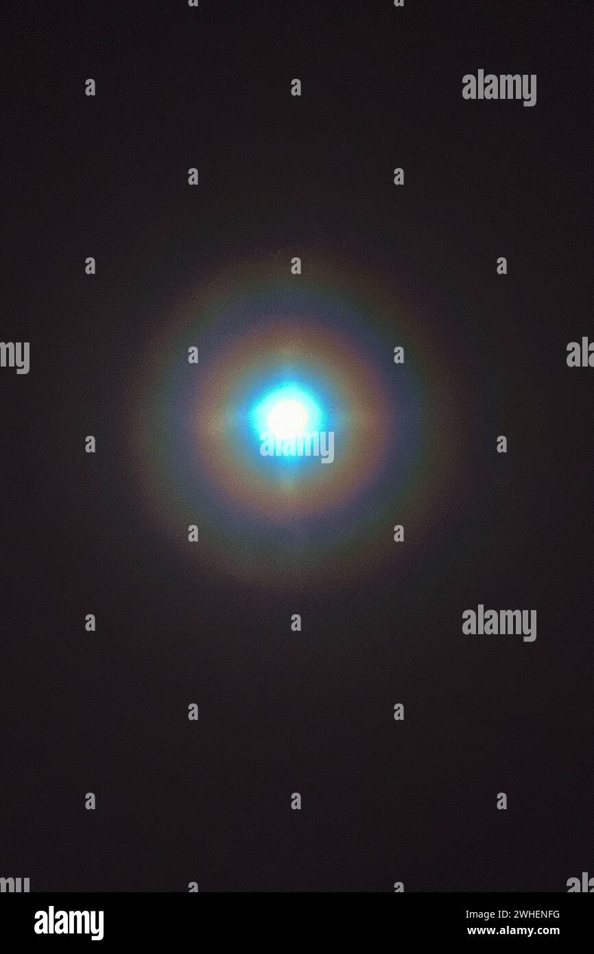 "29.12.2023, Germany, Berlin, Berlin - Aureole and corona have formed around the full moon. 00S231229D274CAROEX.JPG [MODEL RELEASE: NOT Applicable, PR Stock Photo
