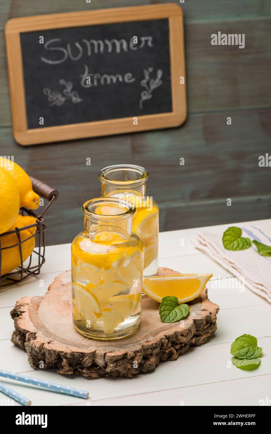 Lemon and lime slices in jars Stock Photo Alamy