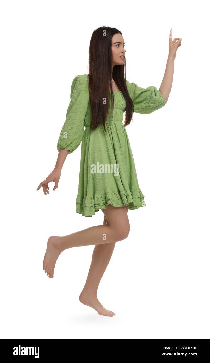 Beautiful girl in green dress on white background Stock Photo