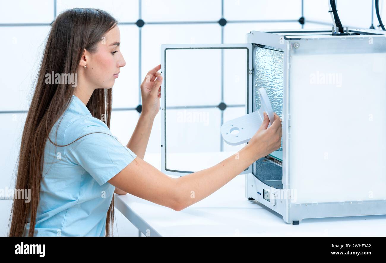 Scientist using 3D printer Stock Photo