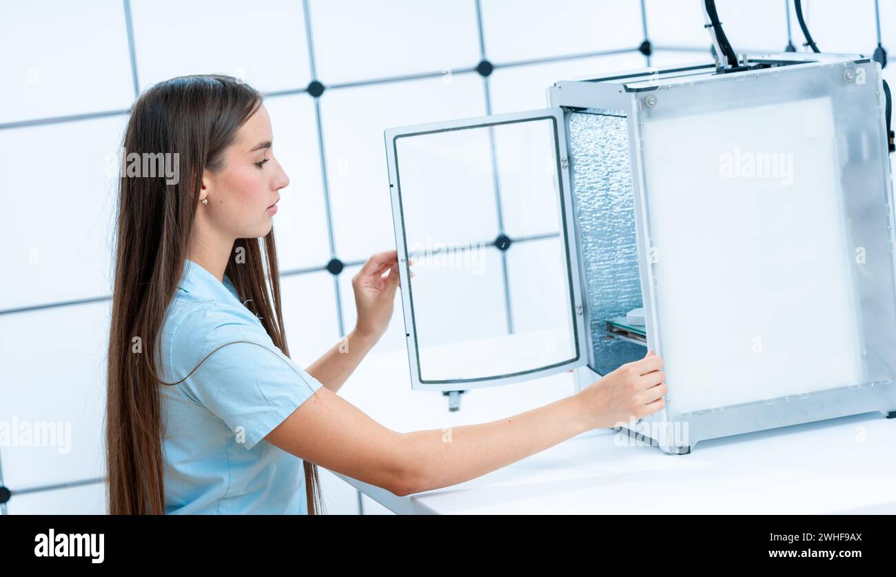 Scientist using 3D printer Stock Photo