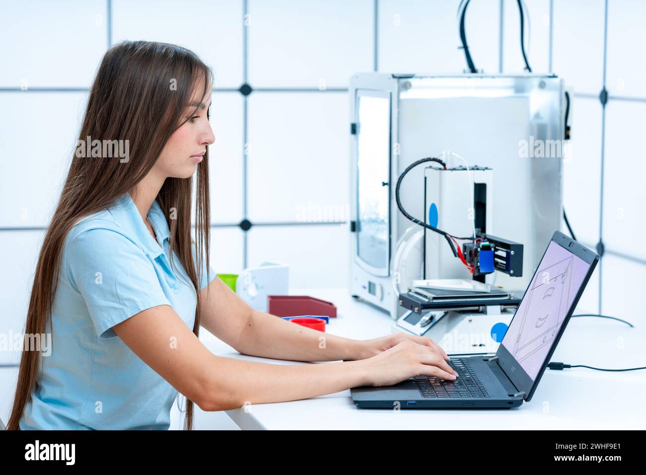 Scientist working with 3D printer Stock Photo