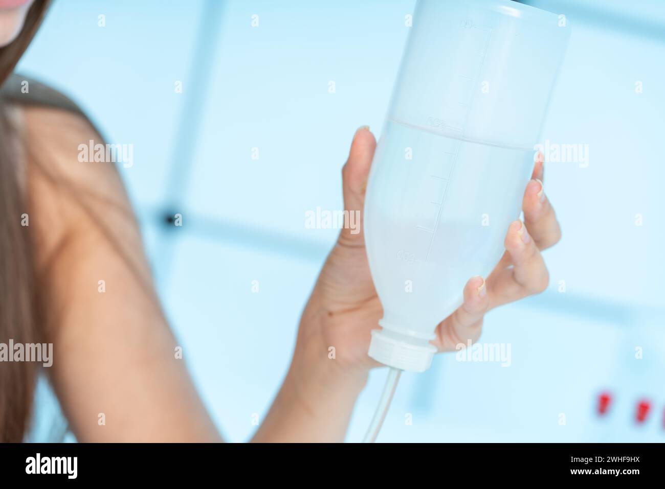 Woman holding liquid for intravenous drip Stock Photo