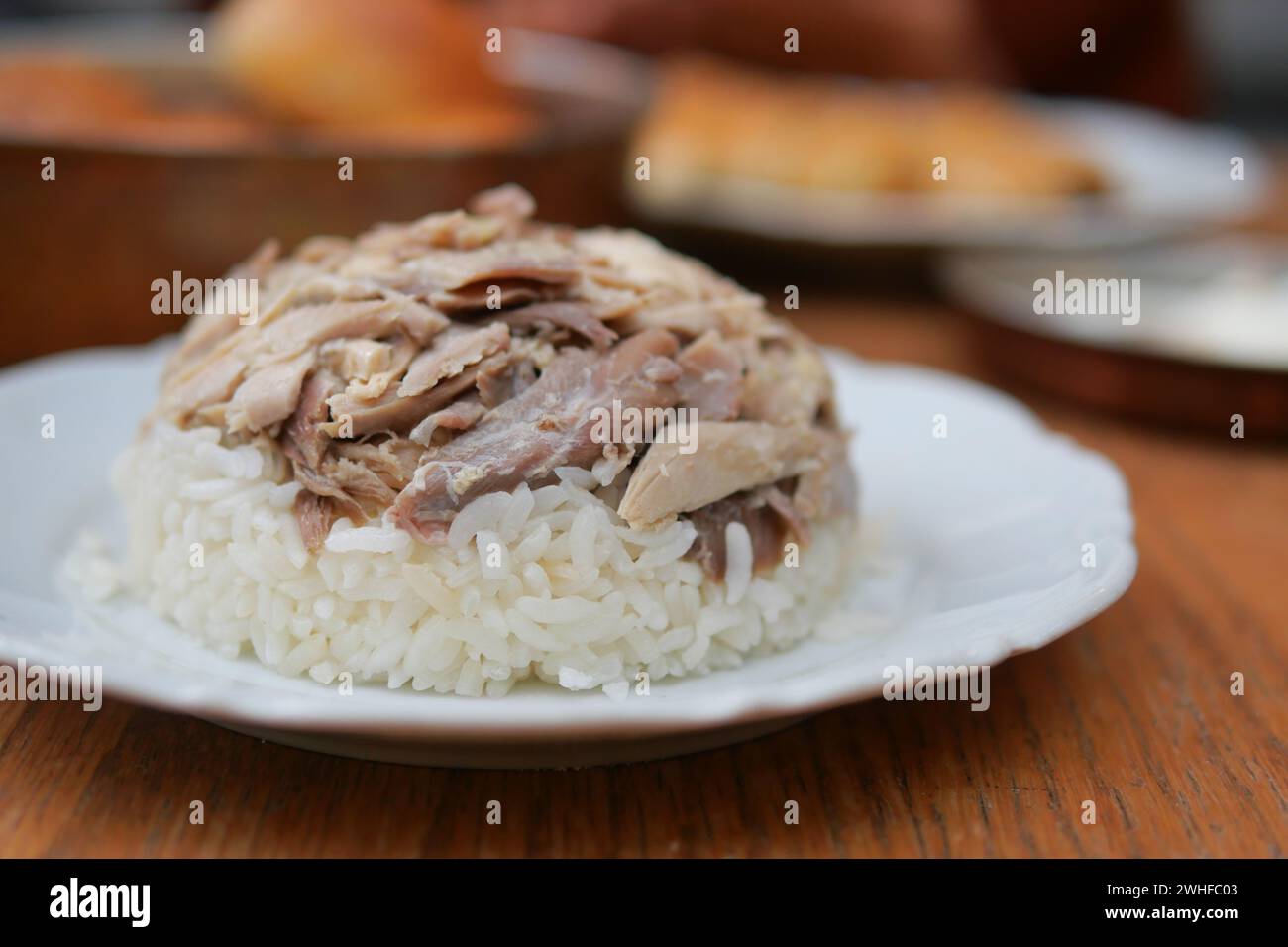 Boiled chicken, steamed rice, pink plate Stock Photo - Alamy