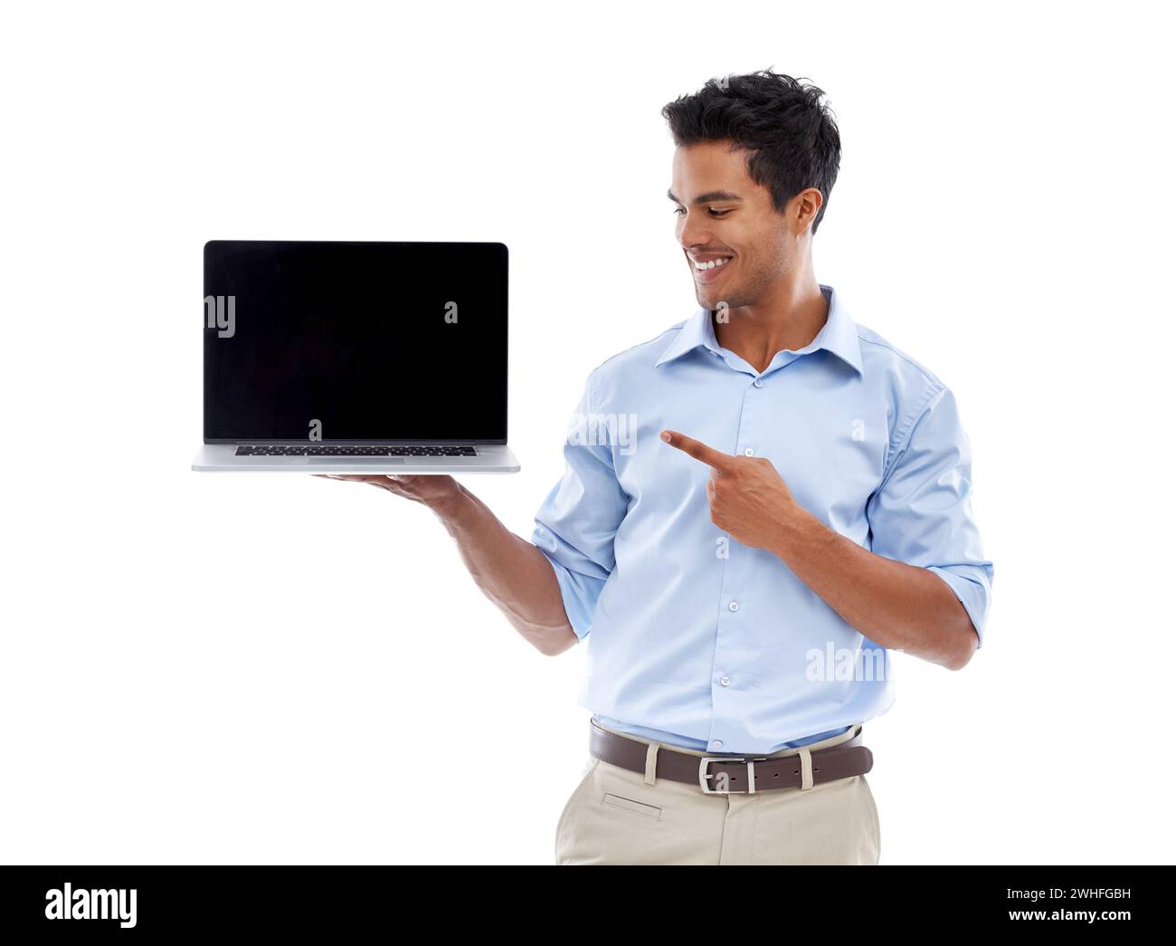 Business man, laptop and point at mockup screen for advertising, ads and info with tech in studio. Software, UX and marketing for web design with Stock Photo