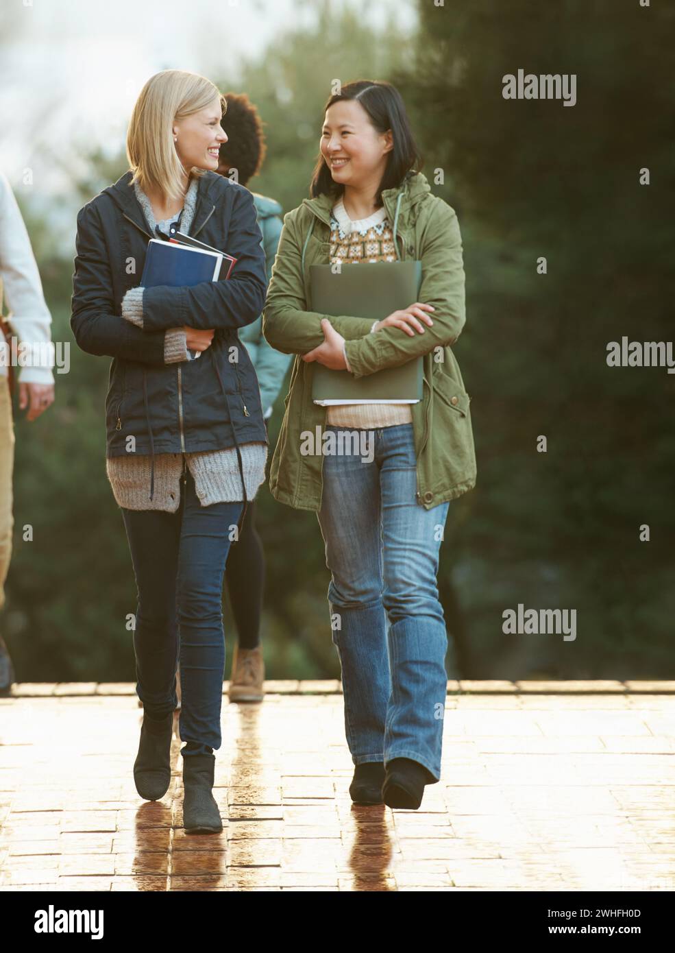 College students talking folder hi-res stock photography and images - Alamy