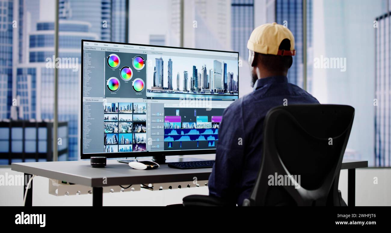 Video Editor Or Designer Using Editing Software Tech On Computer Stock Photo