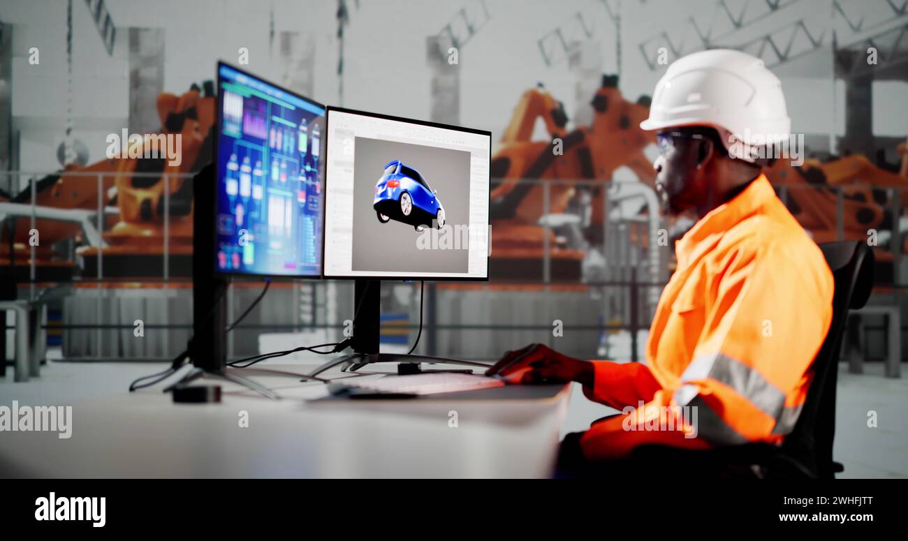 African American Coder Using Computer At Desk. Web Developer Stock Photo