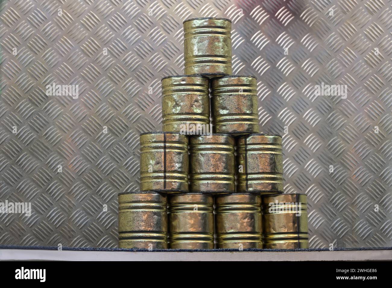 Stacked tin cans for a throwing game at a carnival funfair or Christmas ...