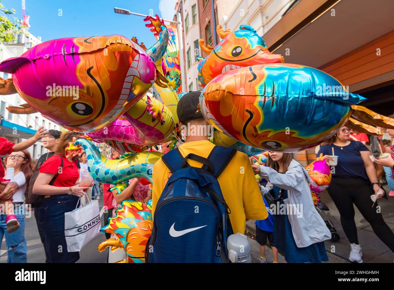 Sydney Australia 10 Feb 2024: Lunar New Year kicked off in earnest today with big crowds of people flocking to China Town in Sydney to eat and celebrate. Inflated toy dragons were not surprisingly very popular among young and old children with 2024 being the year of the Dragon. Food from many different nations was selling from restaurants and specially set up stalls to keep everyone fed and happy. Credit: Stephen Dwyer / Alamy Live News Stock Photo