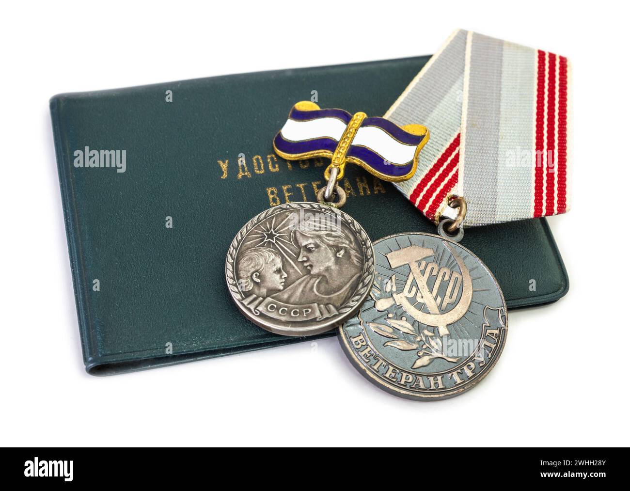 Certificate with inscription: Veterans certificate. Medal with inscription: Veteran of Labor. Me Stock Photo