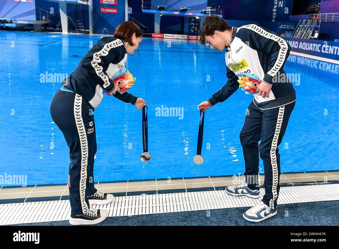 Matteo Santoro and Chiara Pellacani of Italy show the silver medal