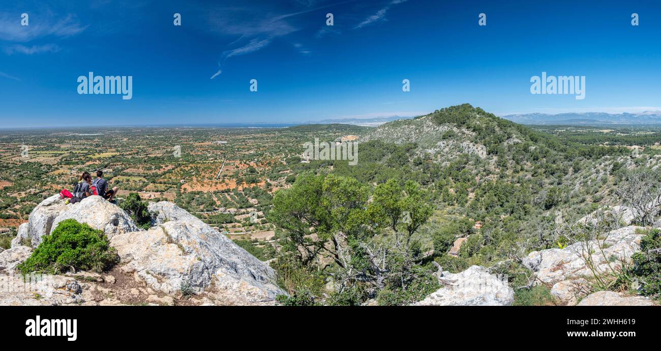 Hikers at the top Stock Photo - Alamy