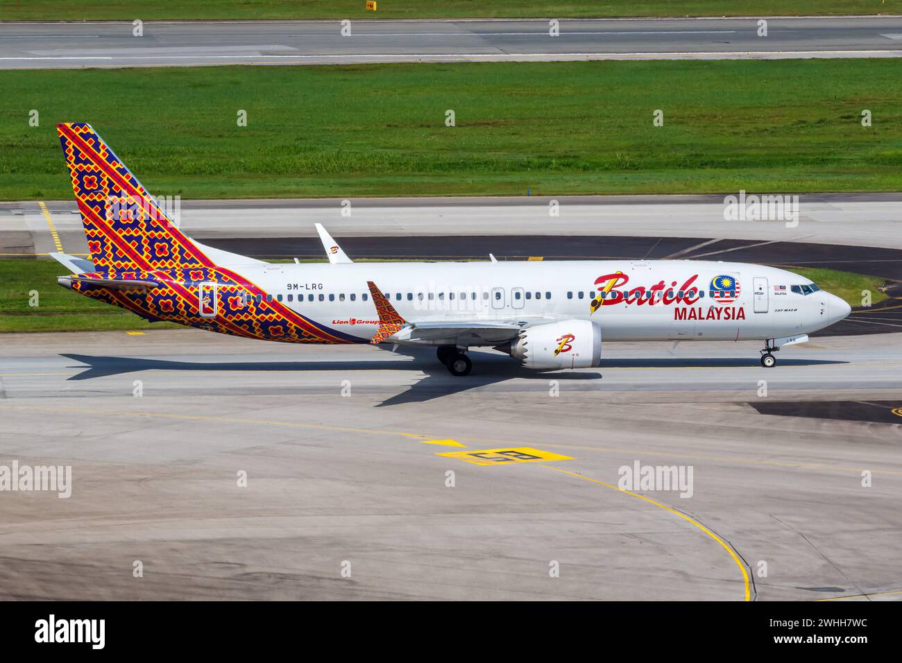 Changi, Singapore - February 3, 2023: A Batik Air Malaysia Boeing 737 MAX 8 Aircraft With The 9M-LRG Flag At Changi Airport (SIN) In Singapore. Stock Photo