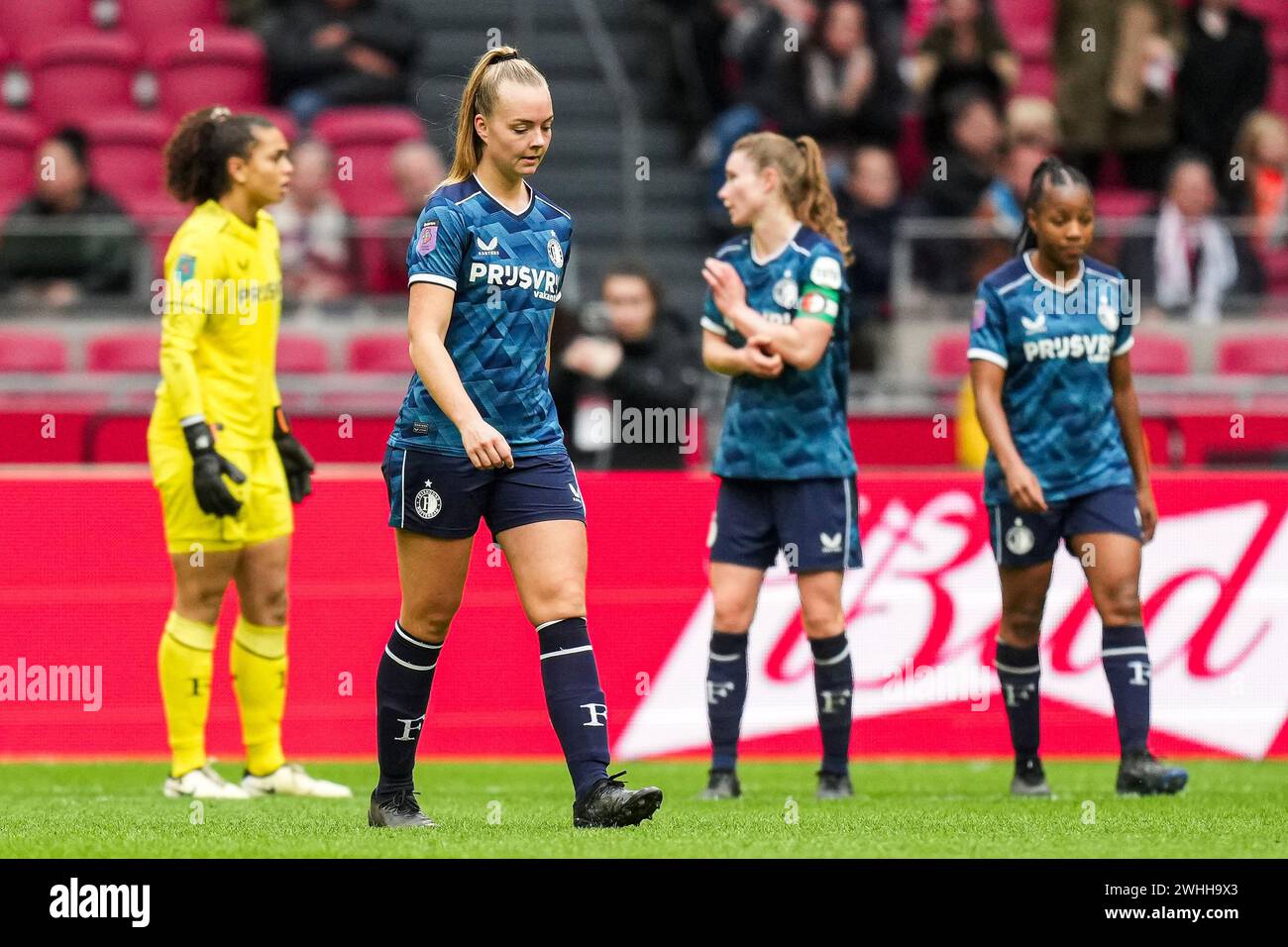 Amsterdam, Netherlands. 10th Feb, 2024. Amsterdam - Amber Verspaget of Feyenoord V1 reacts to the 4-0 during the match between Ajax V1 v Feyenoord V1 at Johan Cruijff Arena on 10 February 2024 in Amsterdam, Netherlands. Credit: box to box pictures/Alamy Live News Stock Photo