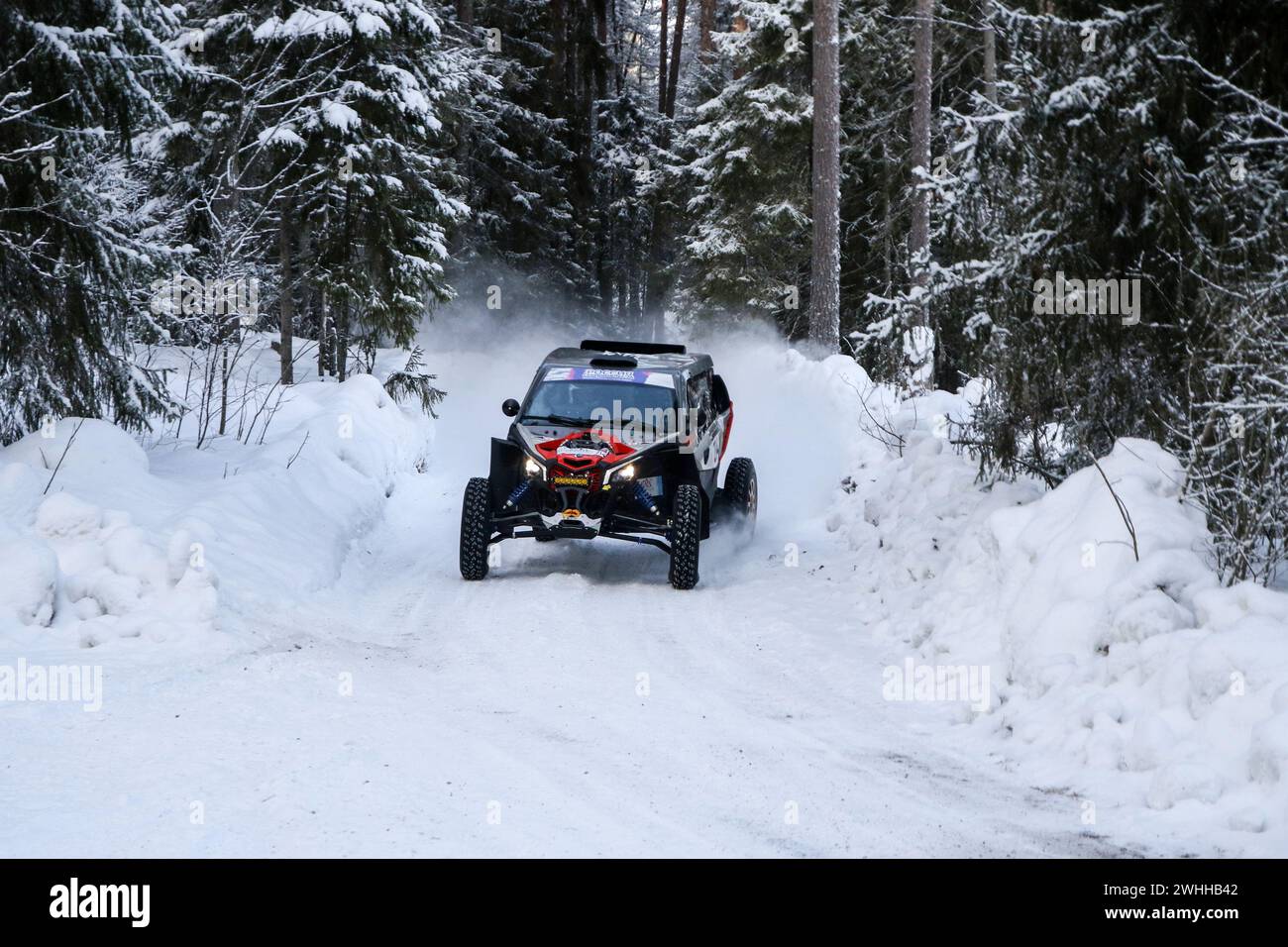 Leningrad Region, Russia. 10th Feb, 2024. Racing crew Pavel Andreev/Gleb Mokeev (214) compete during 1st stage of the Russian Baja Rally Raid Championship “Russia Northern Forest”. (Photo by Maksim Konstantinov/SOPA Image/Sipa USA) Credit: Sipa USA/Alamy Live News Stock Photo