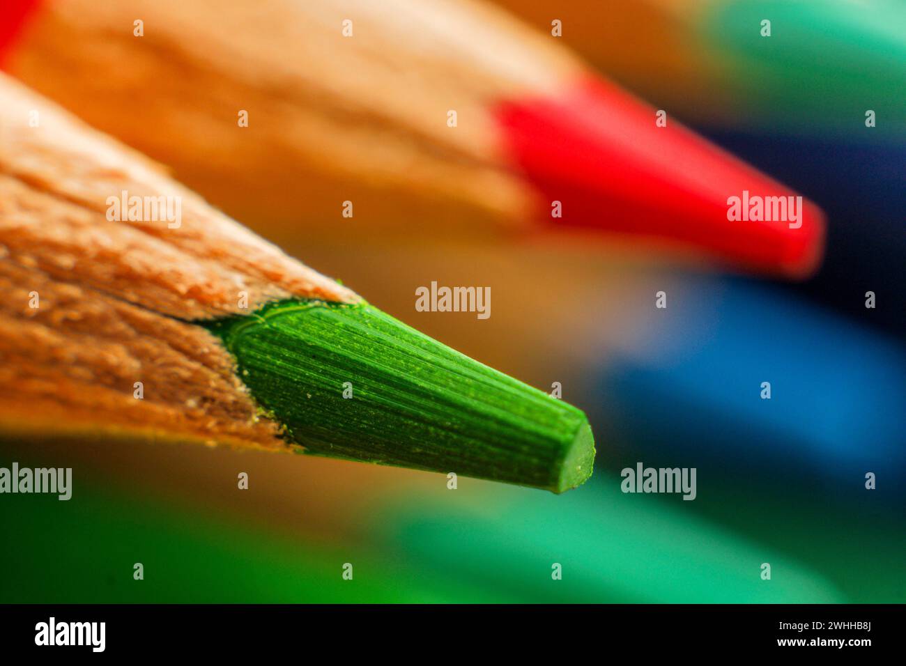 Multiple colored pencils grouped together Stock Photo