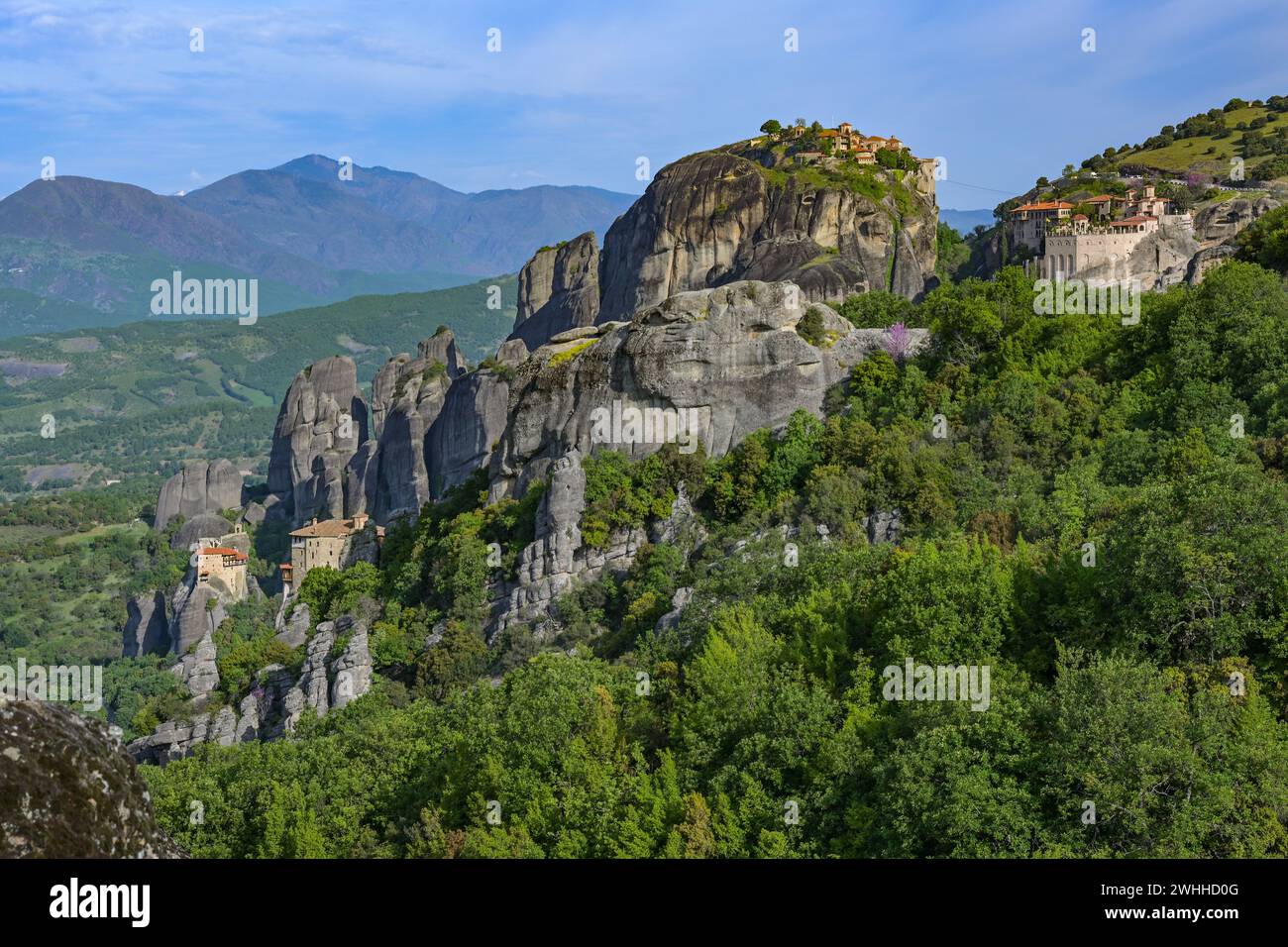 Meteora landscape with four Monasteries situated at the top of various ...