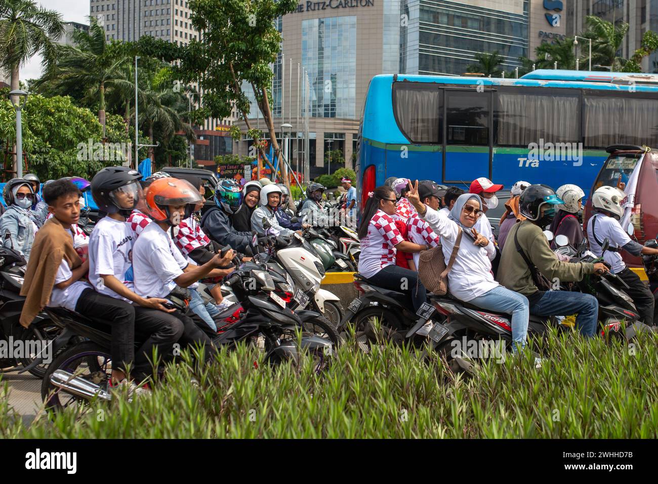 JAKARTA, INDONESIA - FEBRUARY 10, 2024: Supporters of Mr. Prabowo Subianto and Mr. Gibran Rakabuming Raka seen on the streets of Jakarta, Indonesia. Stock Photo