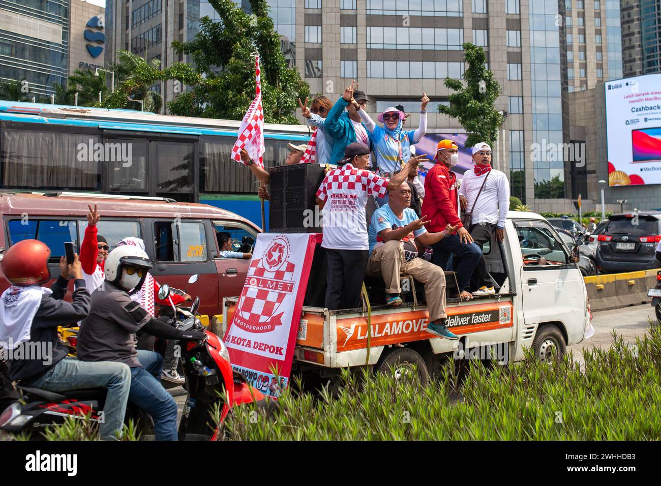 JAKARTA, INDONESIA - FEBRUARY 10, 2024: Supporters of Mr. Prabowo Subianto and Mr. Gibran Rakabuming Raka seen on the streets of Jakarta, Indonesia. Stock Photo