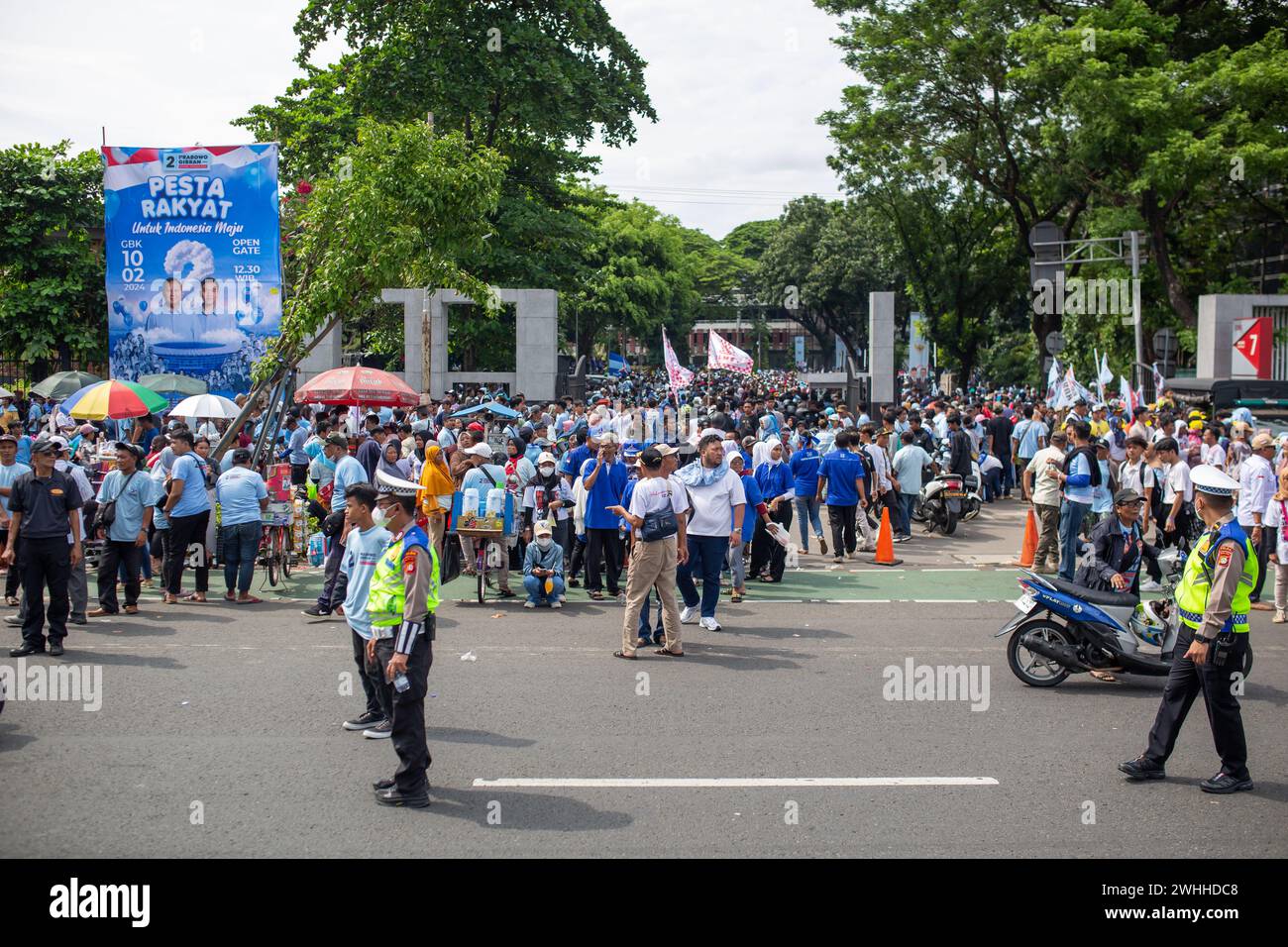 JAKARTA, INDONESIA - FEBRUARY 10, 2024: Supporters of Mr. Prabowo Subianto and Mr. Gibran Rakabuming Raka seen on the streets of Jakarta, Indonesia. Stock Photo
