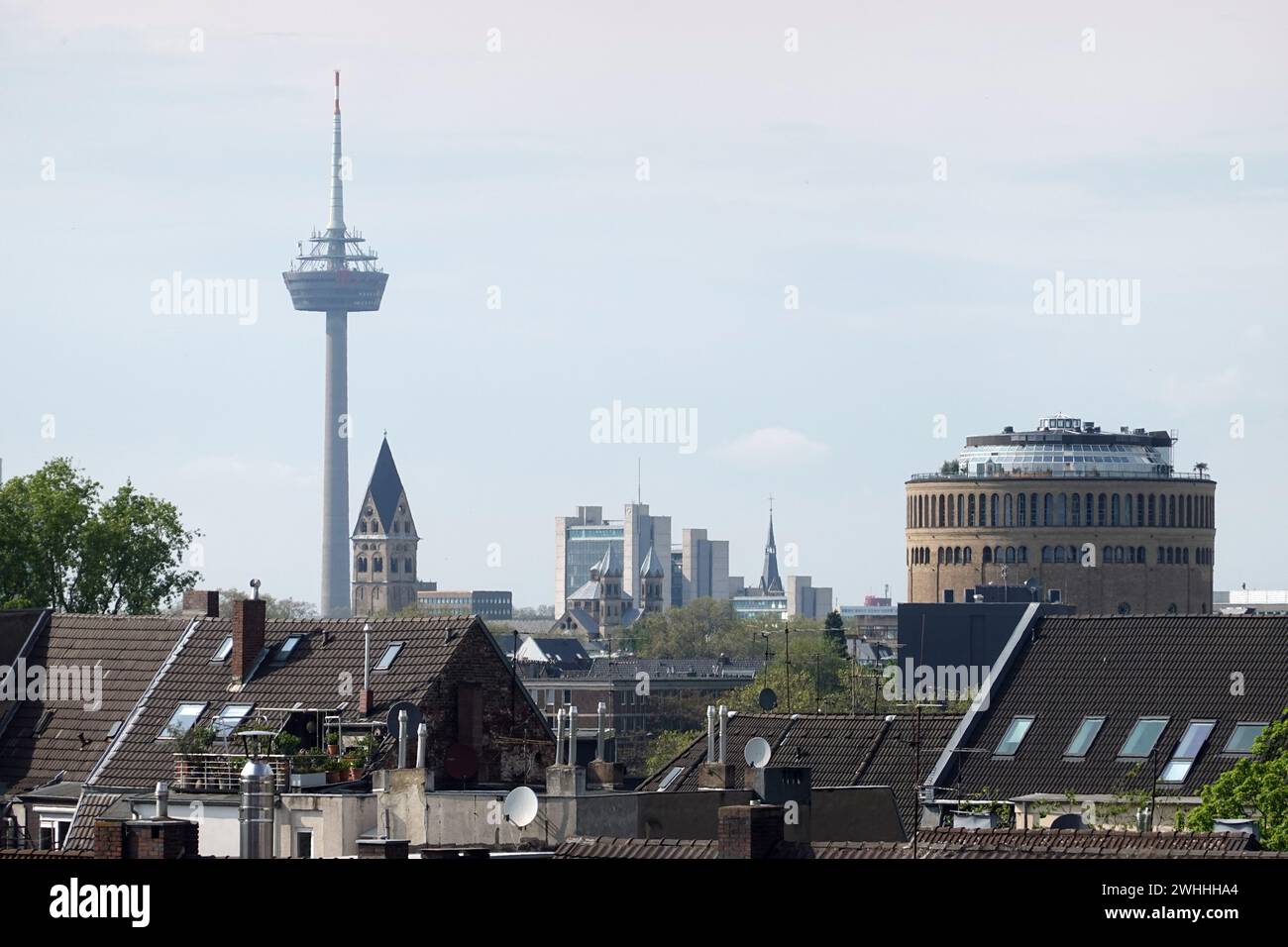 View over the rooftops of Cologne to the former water tower and the ...