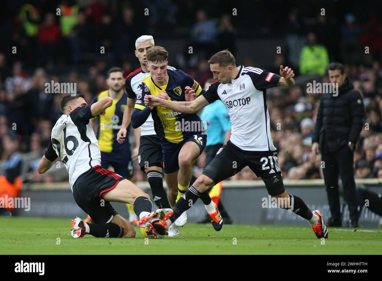 London, UK. 10th Feb, 2024. London, February 10th 2024: Joao Palhinha of Fulham and Timothy Castagne of Fulham tackle on Alex Scott of Bournemouth during the Premier League match between Fulham and Bournemouth at Craven Cottage on February 10, 2024 in London, England. (Pedro Soares/SPP) Credit: SPP Sport Press Photo. /Alamy Live News Stock Photo