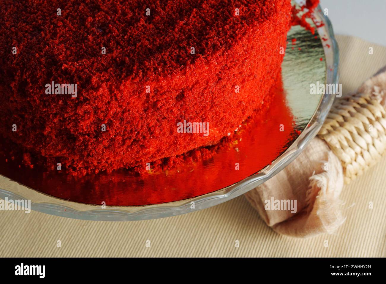 Radiant Red Velvet Cake on a Glass Platter, selective focus Stock Photo