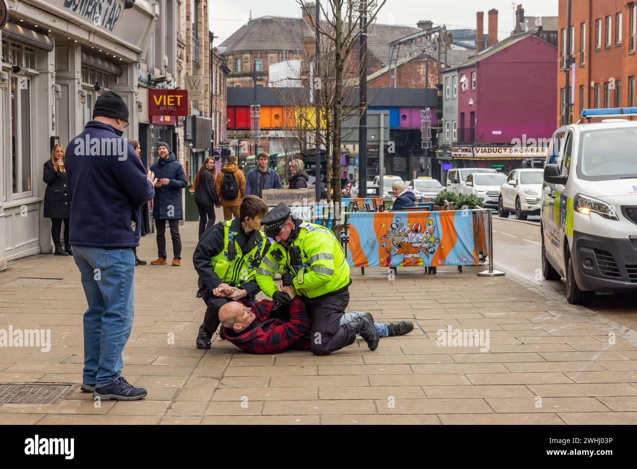Leeds, UK. 10 FEB, 2024. Man is arrested in Leeds after getting into altercation with police following accusations he had shouted offensive language towards palestine protest that marched through the city center, police repeately asked the man for his name and address before he tried to flee and resist arrest. Credit Milo Chandler/Alamy Live News Stock Photo