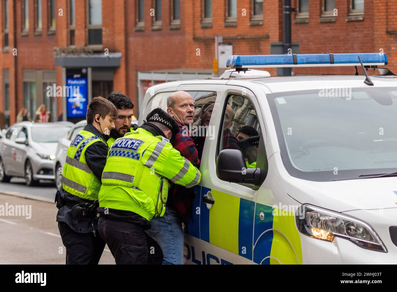 Leeds, UK. 10 FEB, 2024. Man is arrested in Leeds after getting into altercation with police following accusations he had shouted offensive language towards palestine protest that marched through the city center, police repeately asked the man for his name and address before he tried to flee and resist arrest. Credit Milo Chandler/Alamy Live News Stock Photo